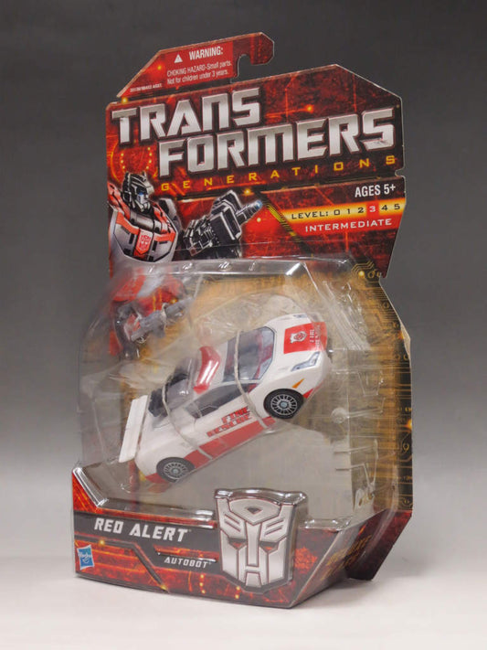 Transformers GENERATIONS Deluxe Klasse Roter Alarm